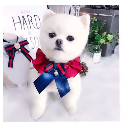 Pet wearing British Retro Campus Trend Bow Tie Collar Bib Bell, featuring stylish bow tie and bell design.